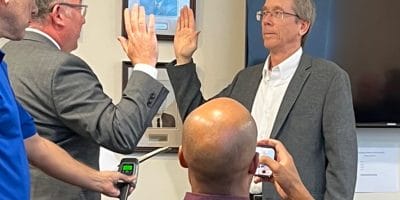 Tom Domonoske is being sworn in