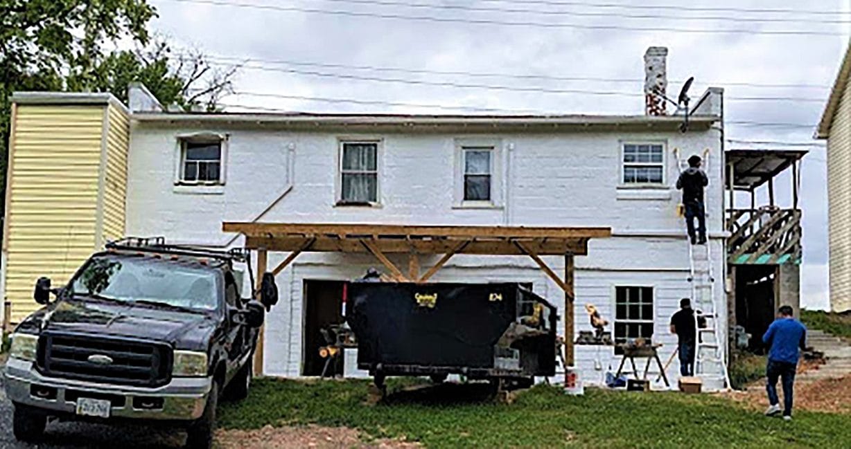 A house with people working on it