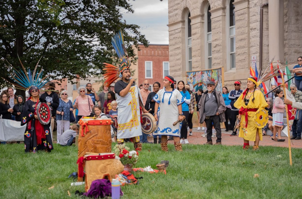 People in colorful garb dance