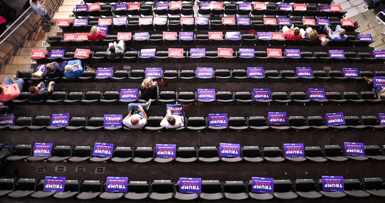 signs placed on every third seat in a section of an arena