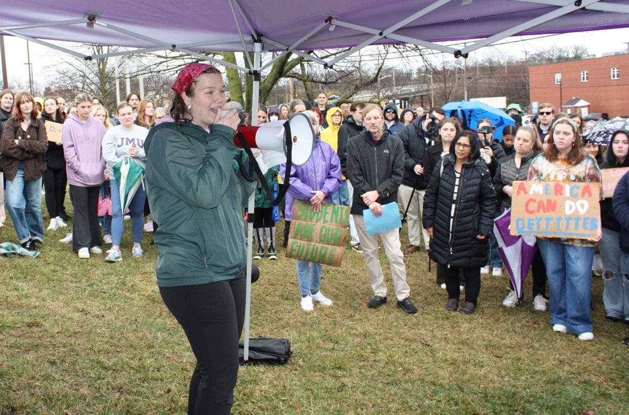 A woman speaking to a crowd