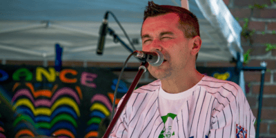 A man singing into a microphone