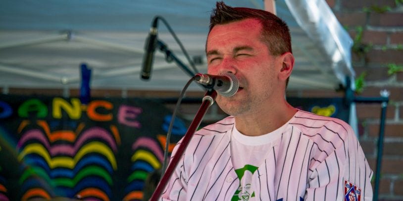 A man singing into a microphone