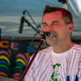 A man singing into a microphone